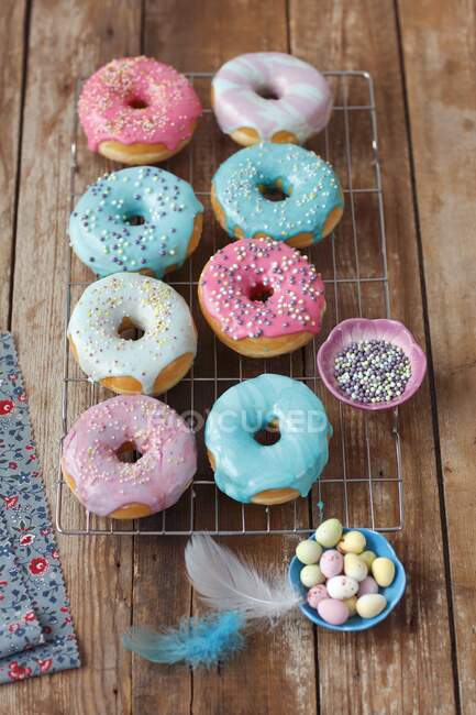 Donuts for Easter on wooden background — Stock Photo