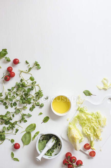 Salad ingredients on a white surface — Stock Photo