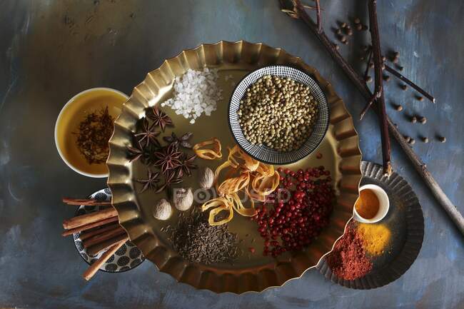 Bowls of spices on a blue background — Stock Photo