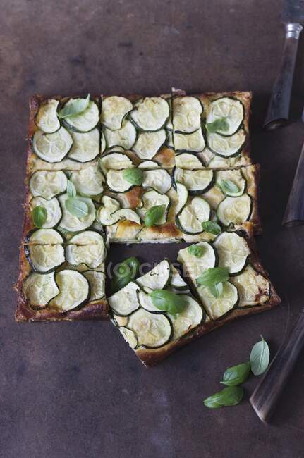 A courgette quiche with basil — Stock Photo