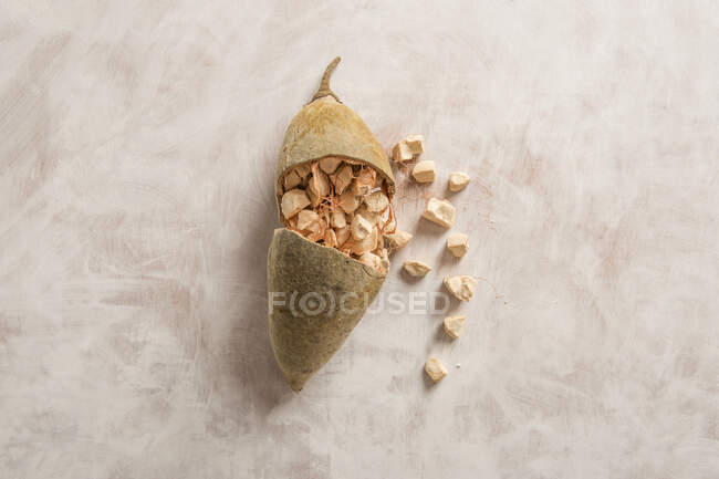Fresh organic nuts in a bowl on a gray background. top view. copy space. — Stock Photo