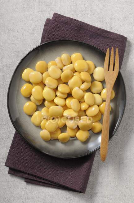 Lupine seeds in brine — Stock Photo