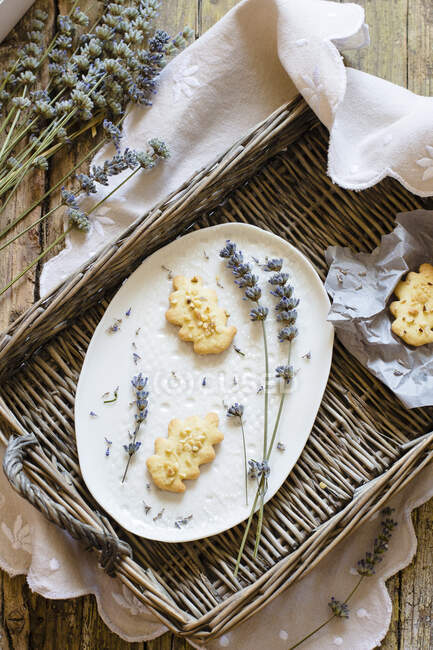 Biscuits with nuts and dried lavender flowers — Stock Photo