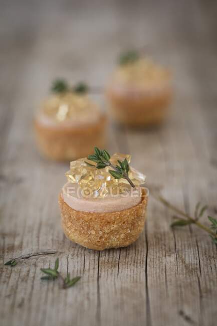 Croustades with goose liver and jelly — Stock Photo