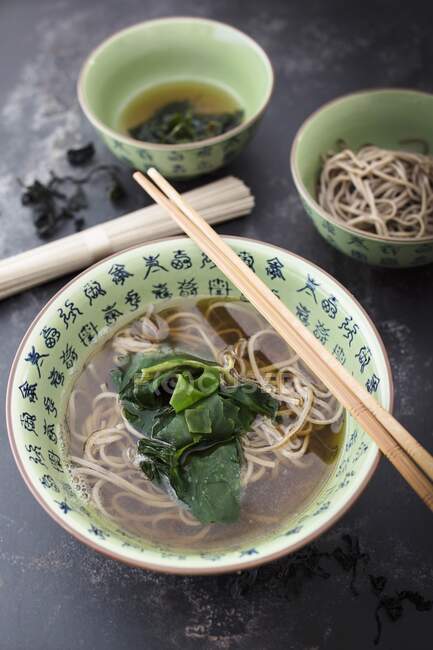 Soba noodle soup with algae — Stock Photo