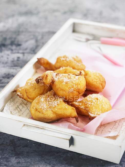 Bunuelos doughnuts from Spain on a wooden tray — Stock Photo