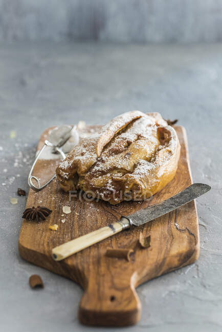 Viennese stollen on a wooden board — Stock Photo