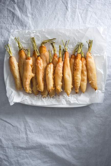 Close-up shot of delicious Carrots in beer batter (vegan) — Stock Photo
