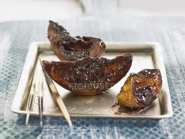Candied oranges with chocolate — Stock Photo