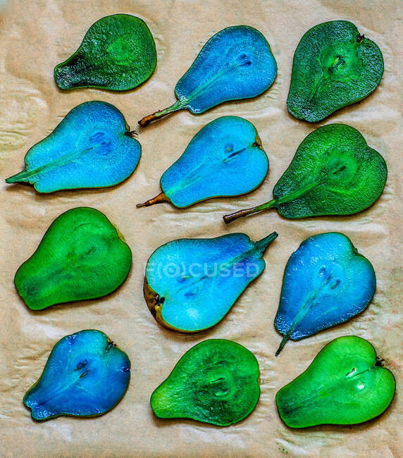 Blue and green coloured pears for cake decorating — Stock Photo