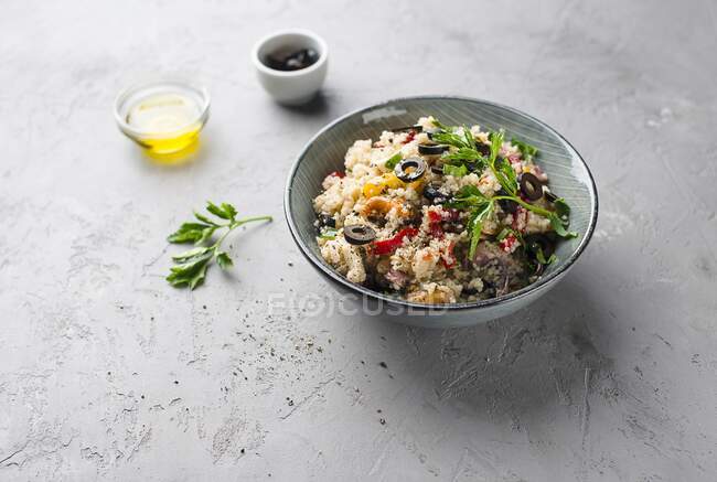 Couscous salad with seafood and vegetables — Stock Photo