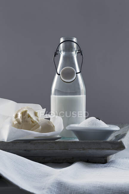 A still life with milk, butter and salt — Stock Photo