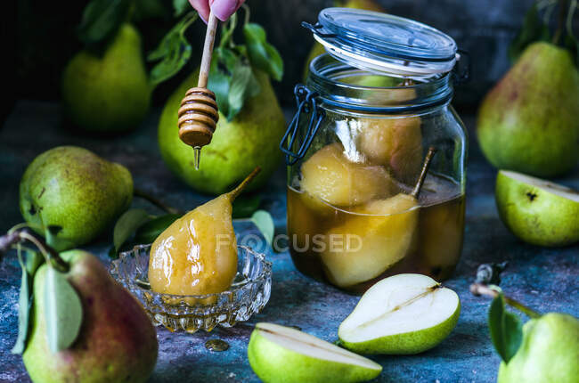 Poached and fresh pears — Stock Photo