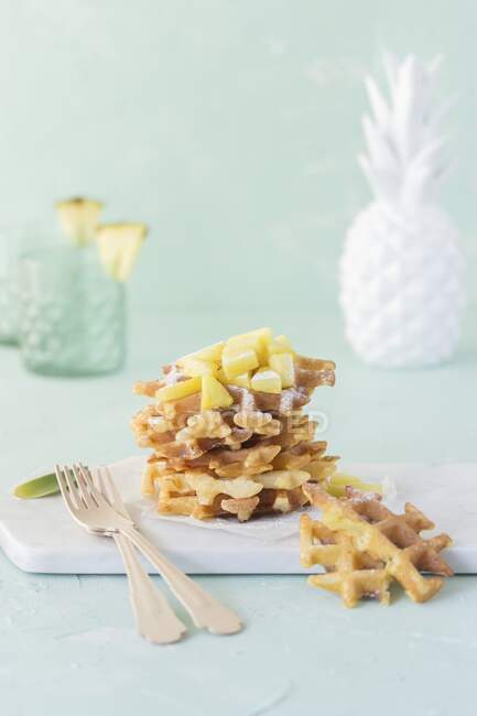 Buttermilk waffles with pineapple chunks — Stock Photo