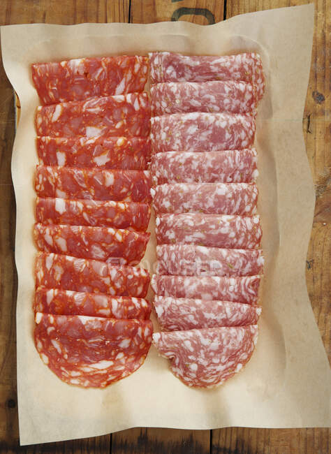 Raw meat on wooden background — Stock Photo