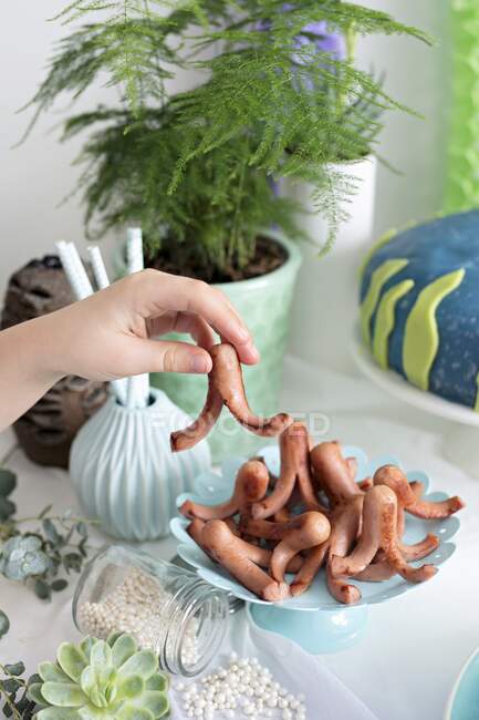 Small octopus sausages for a maritime themed party — Stock Photo