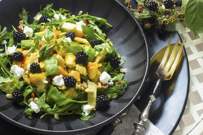 Pumpkin and avocado salad with blackberries and cream cheese — Stock Photo