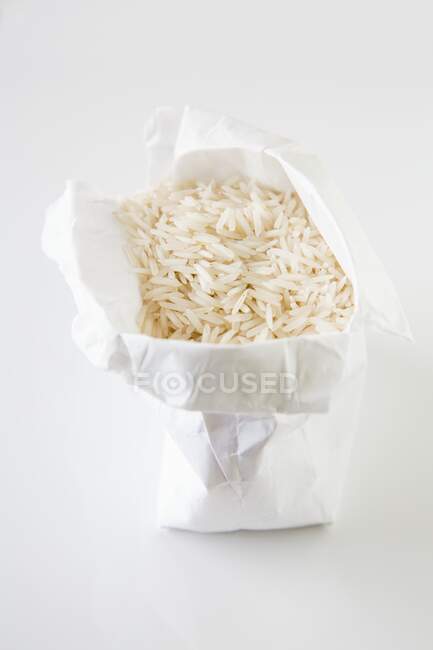 Basmati rice in a paper bag — Stock Photo