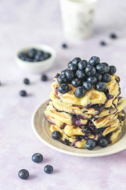 Stack of waffles with fresh blueberries — Stock Photo