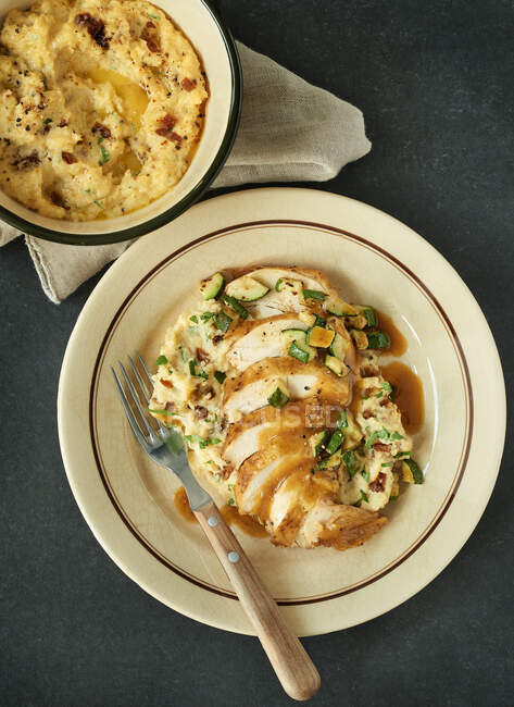 Slice chicken breast with polenta — Stock Photo