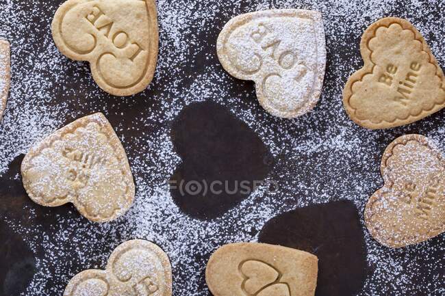 Shortbread biscuits with letterings love and be mine — Stock Photo