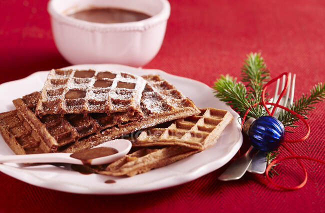 Chocolate waffles with chocolate sauce for Christmas — Stock Photo