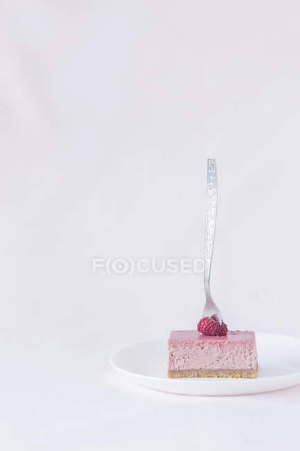 Piece of a raspberry cheesecake — Stock Photo