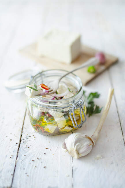 Preserved vegan feta with peperoni and garlic — Stock Photo