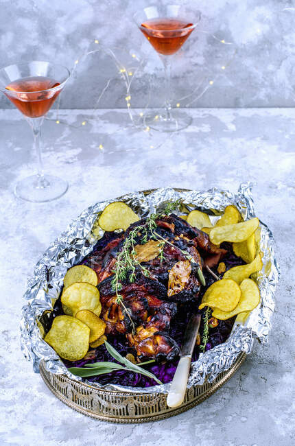 Roast pork with red cabbage and chips for New Year's Eve — Stock Photo
