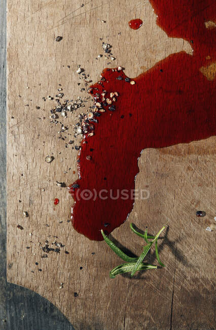 Blood on a wooden cutting board (top view) — Stock Photo