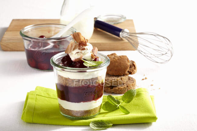 Black Forest-style cherry dessert in a jar — Stock Photo