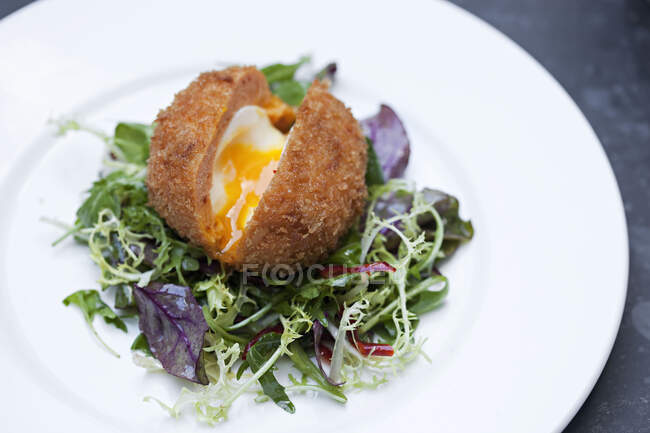 Scotch egg with golden runny yolk — Stock Photo