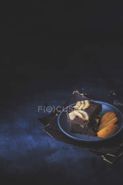 Pear brownie on a dark surface — Stock Photo