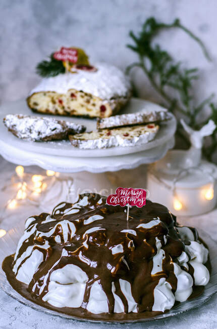 Christmas party with cake and Stollen — Stock Photo