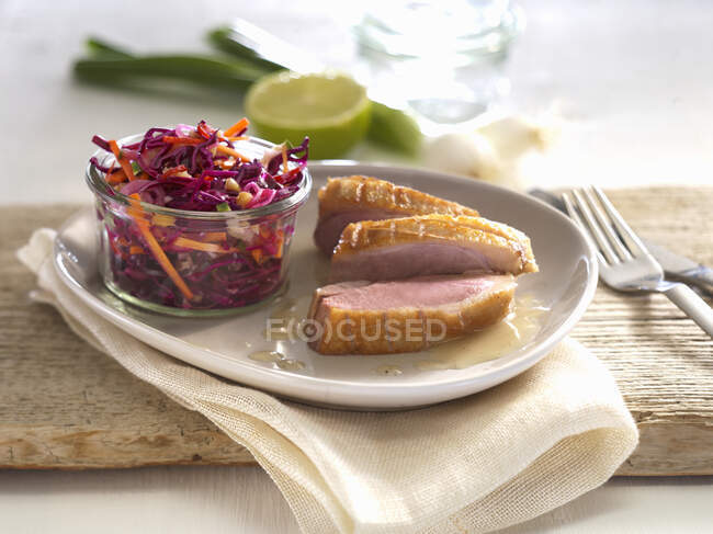 Roast duck breast with a red cabbage medley — Stock Photo