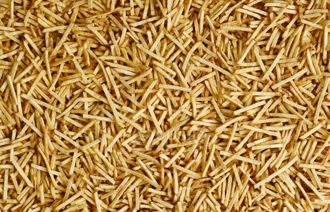 Close-up shot of delicious Salted potato sticks — Stock Photo
