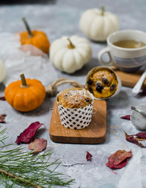 Close-up shot of Pumpkin muffins on rustic background — Stock Photo