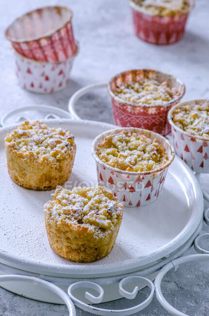 Christmas apple muffins on a white stand — Stock Photo