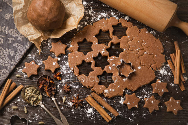 Gingerbread, cutters and some ingredients — Stock Photo