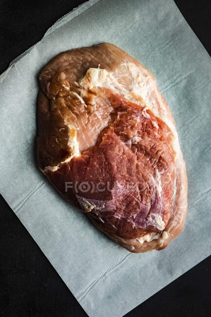 Raw pork meat and spices as a cooking concept for rice with meat and vegetables — Stock Photo