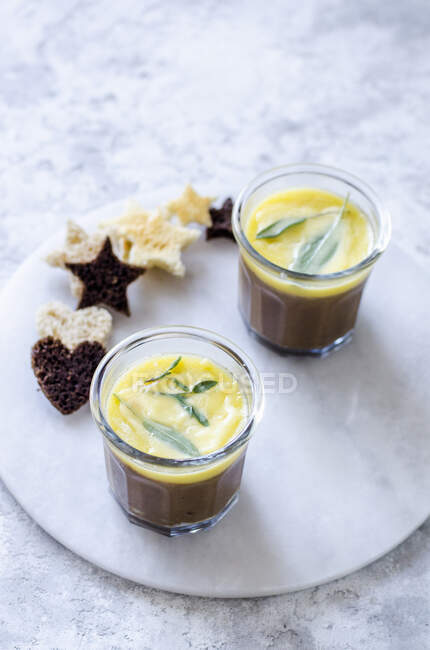 Homemade pate with butter and sage leaves with croutons — Stock Photo