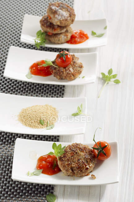 Amaranth cutlets with tomato sauce — Stock Photo