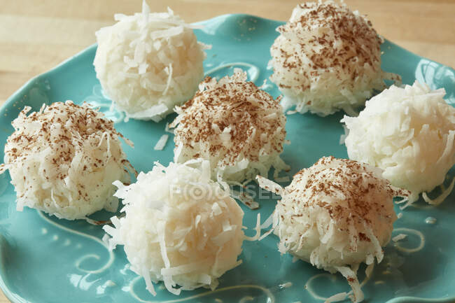 Ricotta truffles with grated coconut — Stock Photo
