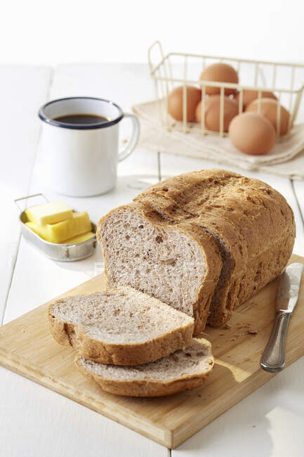 Bread Loaf with black coffee and egg — Stock Photo