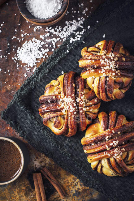Swedish cinnamon buns with coffee — Stock Photo