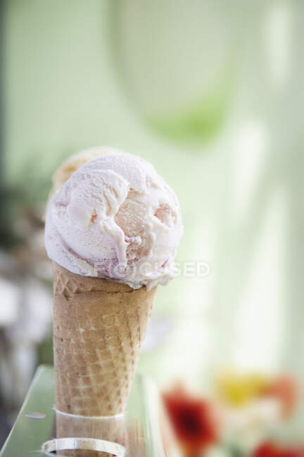 Berry ice cream in a cone — Stock Photo
