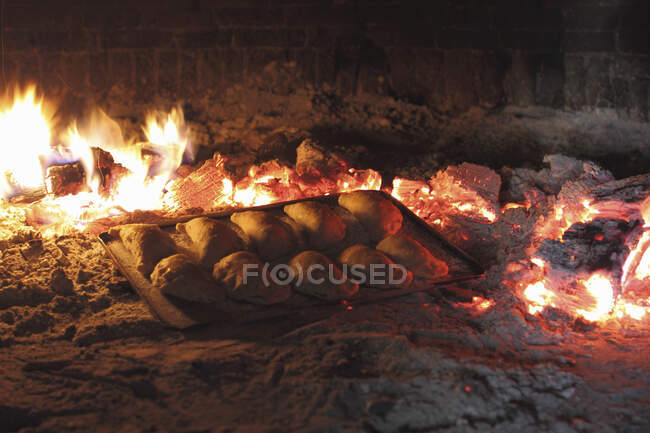 Empanadas in wood fired oven — Stock Photo