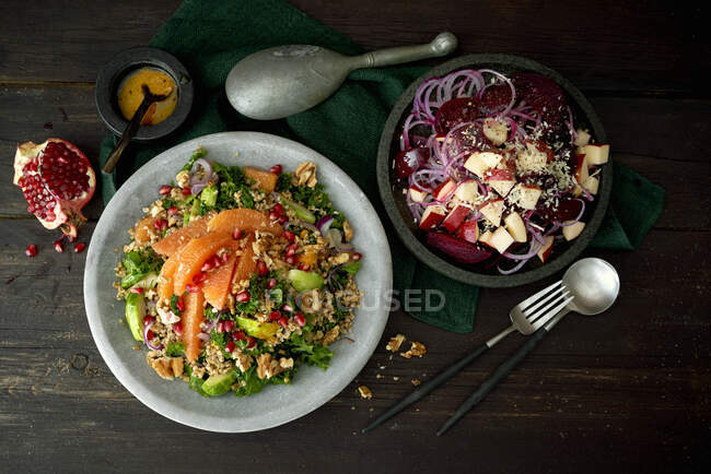 Wholegrain salad with red beets, orange and pomegranate — Stock Photo