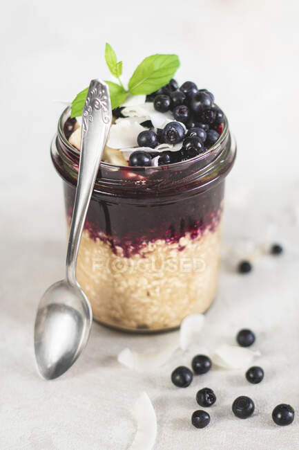 Close-up shot of delicious Oatmeal with blueberry mousse — Stock Photo
