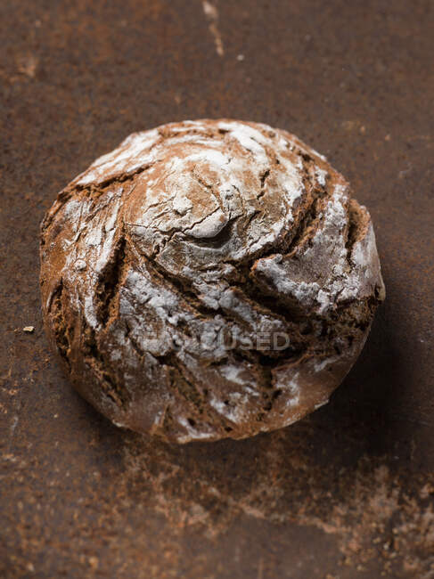 Crusty bread round loaf, top view — Stock Photo